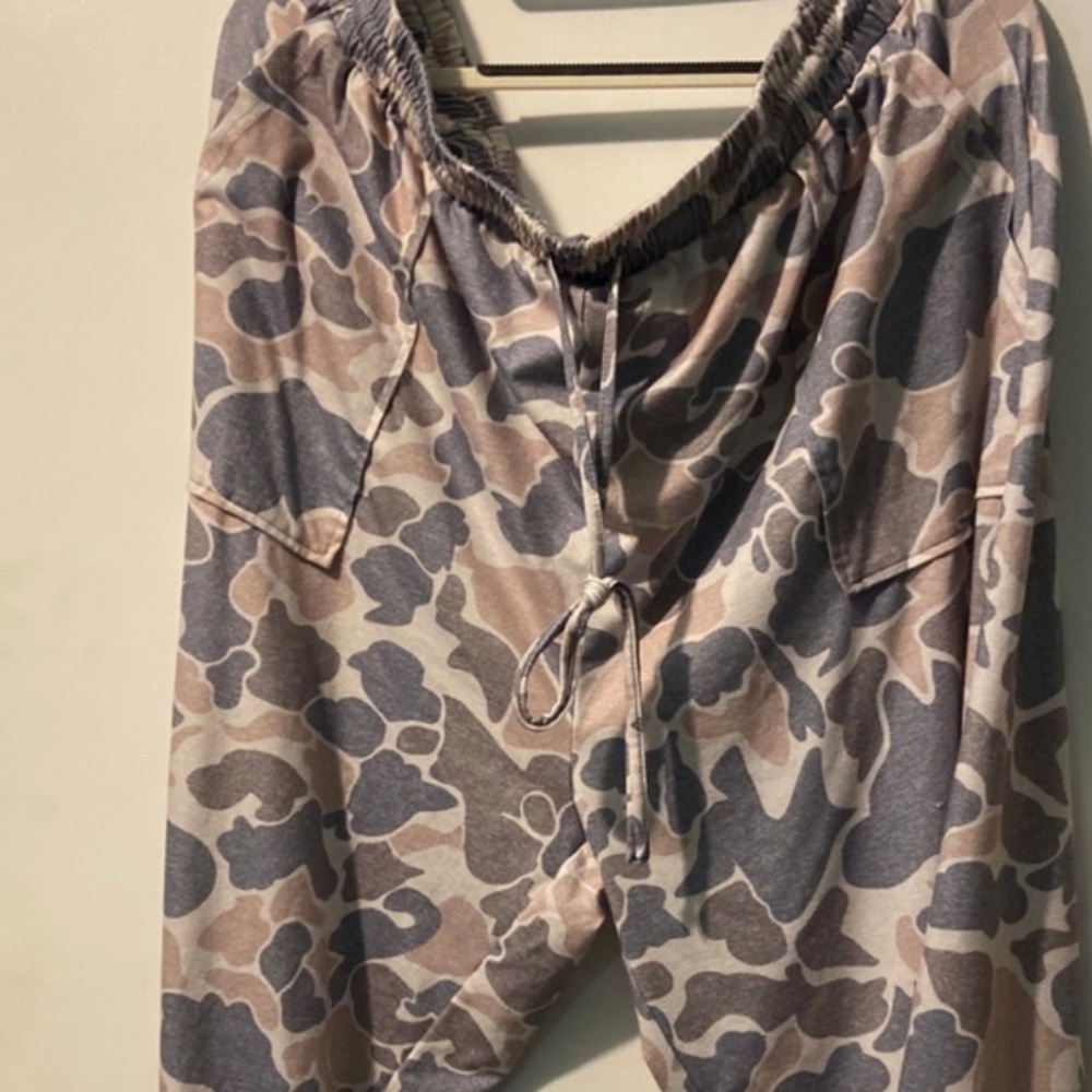 Ladies brand new drawstring camouflage pants .